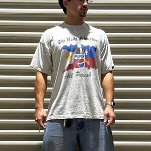 Vintage 90s Pepsi x The Daily Advertiser with the Acadiana flag in graphic